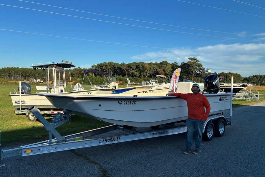 Captain Hunter with the center console boat on its trailer